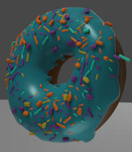 3D donut with turquoise icing and multicolored sprinkles.